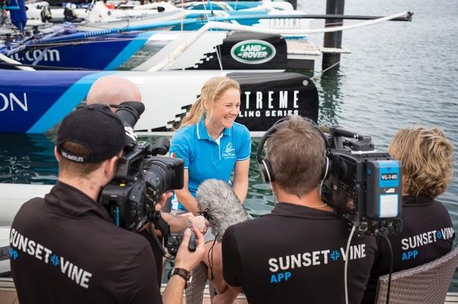 Sarah Ayton, tactician on The Wave, Muscat, during a dockside interview with Sunset+Vine APP © Lloyd Images